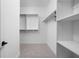 Spacious walk-in closet with custom shelving, providing ample storage space at 9891 Baneberry Ln, Carmel, IN 46290