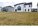 Spacious backyard shows large homes with plenty of yard space creating neighborhood charm at 9928 Deep Royal Way, Indianapolis, IN 46239
