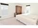 Minimalist bedroom with large cabinet storage and natural light creates a calming space at 9928 Deep Royal Way, Indianapolis, IN 46239