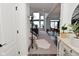 Open-concept foyer with views of the living room, dining area, and staircase, creating an airy atmosphere at 9928 Deep Royal Way, Indianapolis, IN 46239