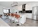 Modern kitchen with white cabinets, granite countertops, stainless steel appliances and a stylish island at 9928 Deep Royal Way, Indianapolis, IN 46239