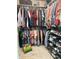 Walk-in closet providing ample storage space for clothing, shoes and accessories at 10118 Leeward Blvd, Indianapolis, IN 46256