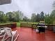 Inviting backyard deck perfect for grilling and relaxing with an expansive green lawn at 10118 Leeward Blvd, Indianapolis, IN 46256