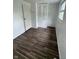 Cozy bedroom with closet, new flooring, and neutral paint at 10361 E 30Th St, Indianapolis, IN 46229