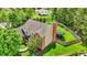 Aerial view of a house with large backyard, mature trees and fenced perimeter at 10882 Camden Ct, Fishers, IN 46038