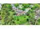 Aerial view of a property with a well-maintained lawn, patio, and green surroundings in a residential area at 10882 Camden Ct, Fishers, IN 46038