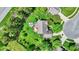 An aerial view of a home with a lovely backyard featuring a patio set and a grassy lawn at 10882 Camden Ct, Fishers, IN 46038