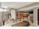Finished basement with exercise equipment and storage, perfect for a home gym at 10882 Camden Ct, Fishers, IN 46038