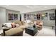 Finished basement with comfy sectional and fun decor at 10882 Camden Ct, Fishers, IN 46038