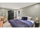 Charming finished basement bedroom with a comfortable bed, wardrobe and bright lighting at 10882 Camden Ct, Fishers, IN 46038