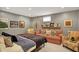 Finished basement bedroom with comfortable seating area and stylish decor at 10882 Camden Ct, Fishers, IN 46038