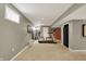 Finished basement featuring carpet, neutral paint, and exercise equipment at 10882 Camden Ct, Fishers, IN 46038