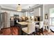 Kitchen area with granite countertops, stainless steel appliances, and two-tone cabinetry at 10882 Camden Ct, Fishers, IN 46038