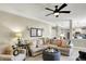 Spacious living room featuring neutral tones, ample seating, and stylish decor at 10882 Camden Ct, Fishers, IN 46038