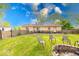 Large backyard featuring a dining set and fire pit with comfortable seating at 109 N Avon Ave, Avon, IN 46123