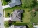 Aerial view showing the property's layout, landscaping, and neighborhood setting, highlighting its curb appeal and location at 11780 Pebblepointe Pass, Carmel, IN 46033