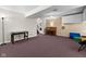 Finished basement offers versatile space with ample room for games and activities at 11780 Pebblepointe Pass, Carmel, IN 46033