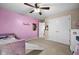 bedroom with ceiling fan, posters and a closet at 11780 Pebblepointe Pass, Carmel, IN 46033