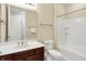 Well-lit bathroom featuring a vanity with sink, toilet, and shower-tub combo for convenience at 127 Coatsville Dr, Westfield, IN 46074