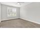 Spacious bedroom features a ceiling fan and shuttered window at 127 Coatsville Dr, Westfield, IN 46074
