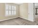 Bright bedroom featuring a window with shutters and neutral walls, creating a serene space at 127 Coatsville Dr, Westfield, IN 46074