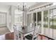 Inviting dining area with large windows and open access to adjacent rooms at 127 Coatsville Dr, Westfield, IN 46074