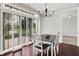 Well-lit dining area with sliding glass doors and neutral decor throughout at 127 Coatsville Dr, Westfield, IN 46074