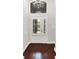 Elegant front entrance with a windowed door, stylish light fixture, and hardwood floors at 127 Coatsville Dr, Westfield, IN 46074