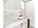 Efficient laundry room with stacked washer/dryer and built-in sink at 127 Coatsville Dr, Westfield, IN 46074