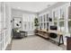 Home office with natural light, modern desk setup, and stylish decor at 127 Coatsville Dr, Westfield, IN 46074