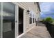 Outdoor back deck with sliding glass doors leading into the home at 14226 Frostburg Dr, Carmel, IN 46033