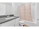 Bathroom featuring a modern vanity, toilet, and a bathtub with a decorative shower curtain at 14226 Frostburg Dr, Carmel, IN 46033