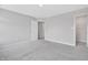 Spacious bedroom featuring neutral walls, carpet flooring, and plenty of natural light at 14226 Frostburg Dr, Carmel, IN 46033