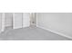 Hallway with neutral walls and carpeted floors offering access to various rooms at 14226 Frostburg Dr, Carmel, IN 46033