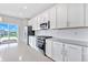 Bright kitchen with white cabinetry, stainless steel appliances, and subway tile backsplash at 14226 Frostburg Dr, Carmel, IN 46033