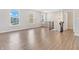 Spacious living room with wood floors, staircase and windows at 14226 Frostburg Dr, Carmel, IN 46033