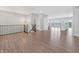 Open concept living area, connecting to the kitchen, featuring modern lighting and wood floors at 14226 Frostburg Dr, Carmel, IN 46033