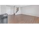 Spacious living room with wood-look flooring, neutral walls, offering a versatile space for customization at 14226 Frostburg Dr, Carmel, IN 46033
