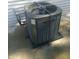 An exterior shot of a Trane air conditioner with a chain wrapped around it at 1433 Charles St, Indianapolis, IN 46225