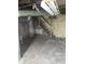 Basement with water heater and piping and some storage space at 1433 Charles St, Indianapolis, IN 46225