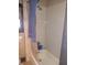 Standard tiled shower and tub with chrome fixtures in an average bathroom at 1433 Charles St, Indianapolis, IN 46225