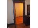 Bedroom showcasing an open closet with black trim, wood floors, and view of the closet at 1433 Charles St, Indianapolis, IN 46225