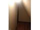 View of a closet with wood floors and light tan walls at 1433 Charles St, Indianapolis, IN 46225