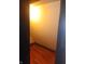 View of a closet with wood floors and light tan walls at 1433 Charles St, Indianapolis, IN 46225