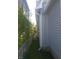 Side of the home featuring the siding, grass and an AC unit at 1433 Charles St, Indianapolis, IN 46225