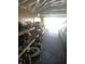 Large garage interior with tools, work benches, and ample storage for all your equipment and projects at 1433 Charles St, Indianapolis, IN 46225