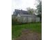 View of the backyard including a garage at 1433 Charles St, Indianapolis, IN 46225