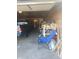 Spacious garage interior with a parked truck, work bench, and ample storage space for tools and equipment at 1433 Charles St, Indianapolis, IN 46225