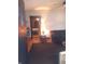 Inviting living room with a cozy couch, warm lighting, and an open doorway at 1433 Charles St, Indianapolis, IN 46225