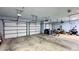 Spacious three car garage with multiple automatic doors providing ample space for vehicles and storage at 1544 Olive Branch Cir, Greenwood, IN 46143